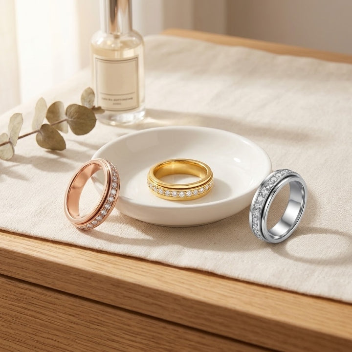 Drehring mit Zirkonia, Titanstahl, 6 mm breit, Silber, Gold oder Roségold -    Zorenza
