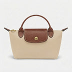 Mini-Handtasche mit Lederdetails und Goldverschluss -    Zorenza
