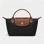 Mini-Handtasche mit Lederdetails und Goldverschluss -    Zorenza