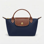 Mini-Handtasche mit Lederdetails und Goldverschluss -    Zorenza