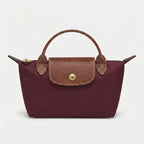 Mini-Handtasche mit Lederdetails und Goldverschluss -    Zorenza
