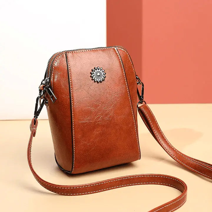 Kleine Crossbody-Tasche in Lederoptik mit mehreren Fächern – Verstellbarer Riemen Zorenza