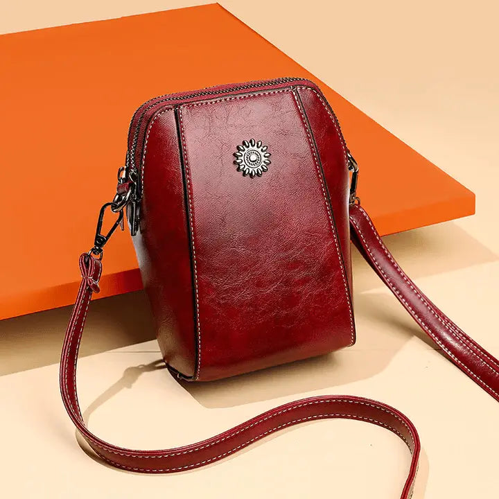 Kleine Crossbody-Tasche in Lederoptik mit mehreren Fächern – Verstellbarer Riemen Zorenza