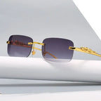 Randlose Sonnenbrille mit Leopardenkopf-Design -    Zorenza