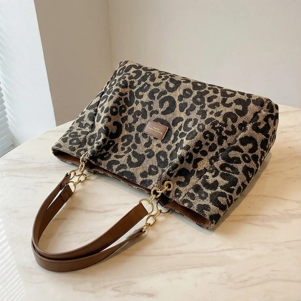 Leotard-Print Tote-Bag mit Goldketten-Detail Zorenza