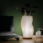 Tischleuchte mit Wellendesign und LED-Licht -    Zorenza