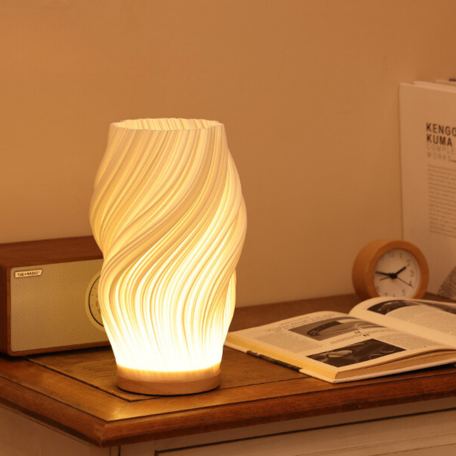 Tischleuchte mit Wellendesign und LED-Licht -    Zorenza
