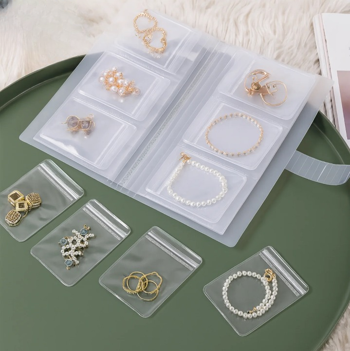 Schmuck-Organizer-Buch mit 30 transparenten Taschen Zorenza