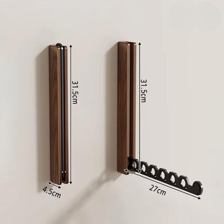 Klappbarer Wandkleiderständer aus Holz mit Platzspar-Design -    Zorenza