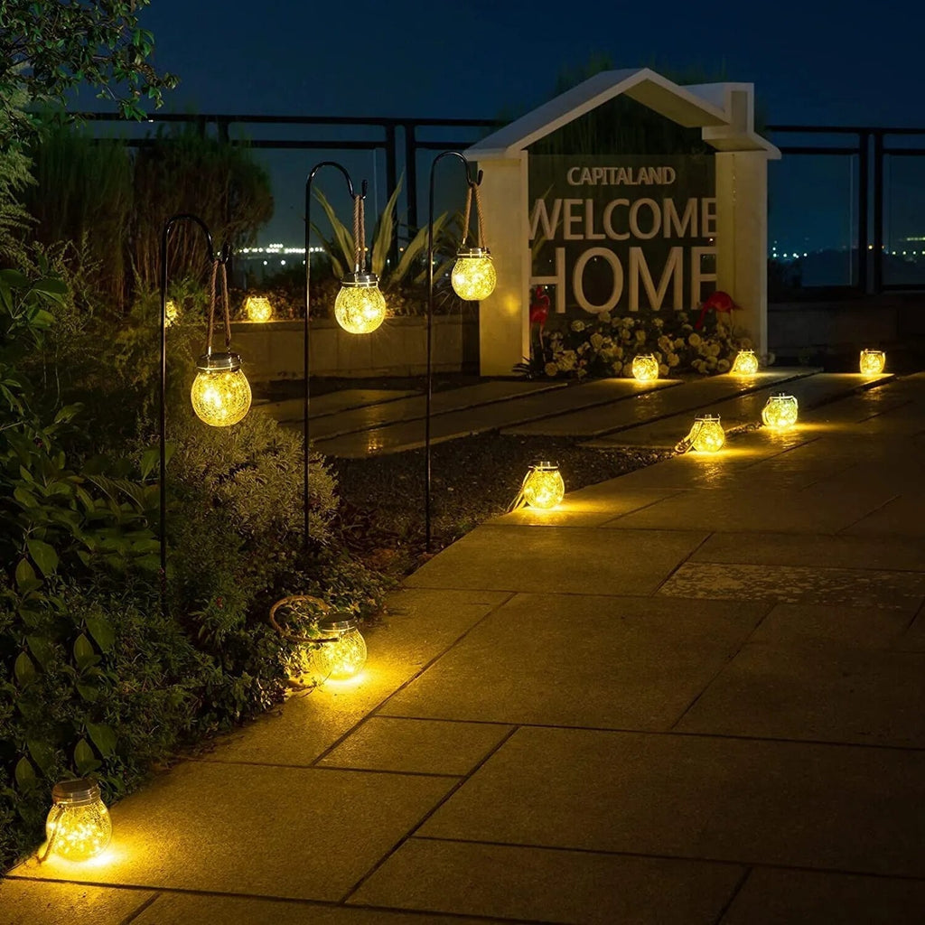 Solar-Gartenlaterne aus Glas mit LED-Lichterkette -    Zorenza