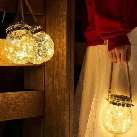 Solar-Gartenlaterne aus Glas mit LED-Lichterkette -    Zorenza