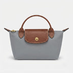 Mini-Handtasche mit Lederdetails und Goldverschluss -    Zorenza